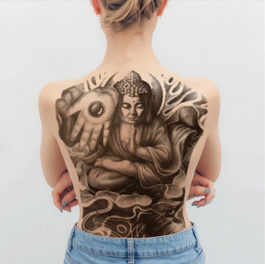 Minimalist Buddha tattoo by Loz Thomas - Tattoogrid.net