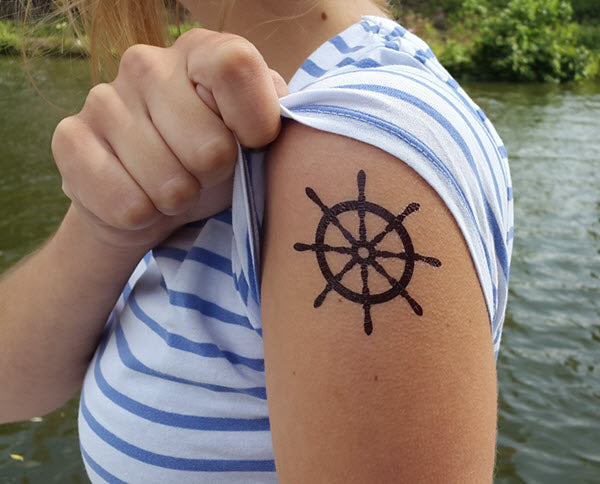 Wooden anchor and ship's wheel tattoo | Ship wheel tattoo, Wheel tattoo,  Tattoo designs